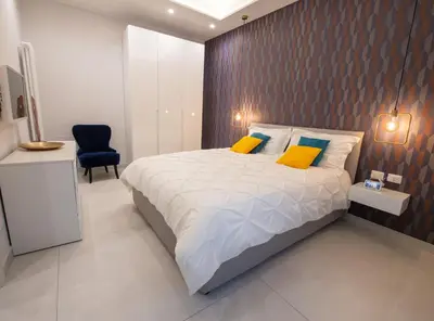 Letto o letti in una camera di Napoli City Center - Appartamenti e Camere