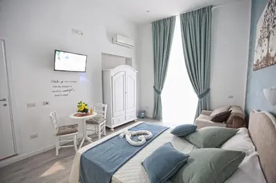 Letto o letti in una camera di Maison Nilo 15