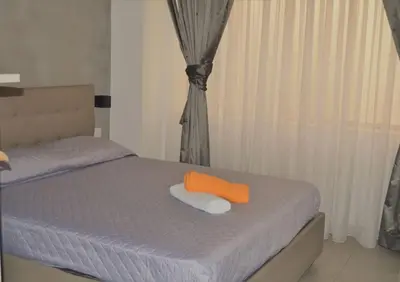 Letto o letti in una camera di Napoli Via Toledo