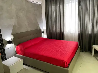 Letto o letti in una camera di Napoli Via Toledo