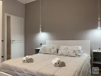Letto o letti in una camera di Borgo Antignano