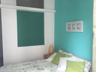 Letto o letti in una camera di Casa di Erminia