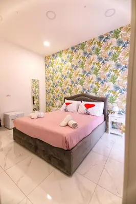 Letto o letti in una camera di B&B AMORE