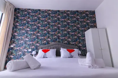 Letto o letti in una camera di B&B AMORE