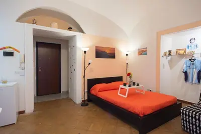 Letto o letti in una camera di Napoli centro apartment A balcony in the heart of naples