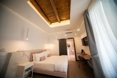Letto o letti in una camera di 4heavens_naples