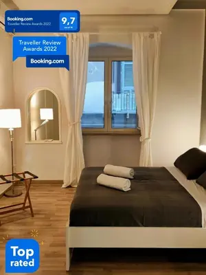 Letto o letti in una camera di Pithecusa Home