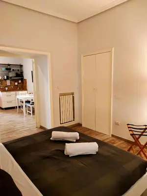 Letto o letti in una camera di Pithecusa Home