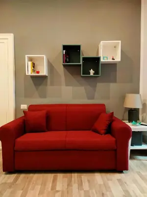 Area soggiorno di Pithecusa Home