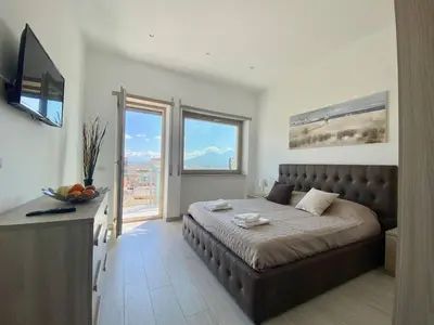 Letto o letti in una camera di PORTO Luxury House Casa Panoramica