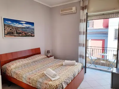 Letto o letti in una camera di Napoli central