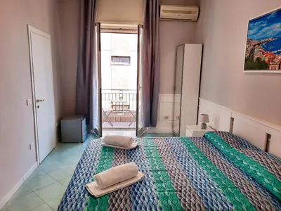 Letto o letti in una camera di Napoli central