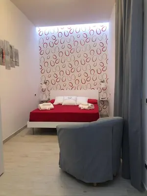 Letto o letti in una camera di Il Cornicello di Carola-Appartamento supersFizioso