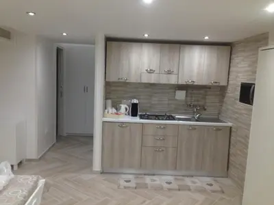 Cucina o angolo cottura di Casa Vacanze Piedigrotta 57