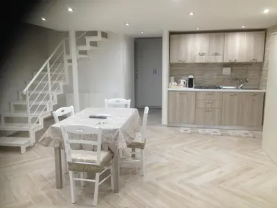 Cucina o angolo cottura di Casa Vacanze Piedigrotta 57