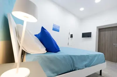 Letto o letti in una camera di Napoli Museo bed and breakfast