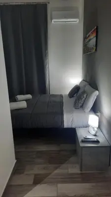 Letto o letti in una camera di Casa Napul'è