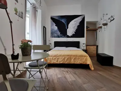 Letto o letti in una camera di Napoli Centro Studios