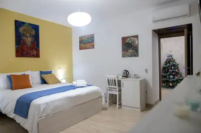 Letto o letti in una camera di 'A Room de' Scugnizzi