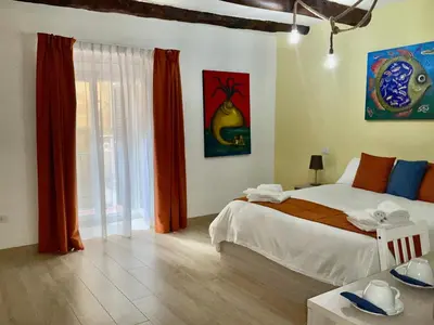 Letto o letti in una camera di 'A Room de' Scugnizzi