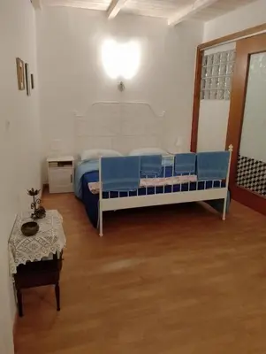 Letto o letti in una camera di CasaIodice