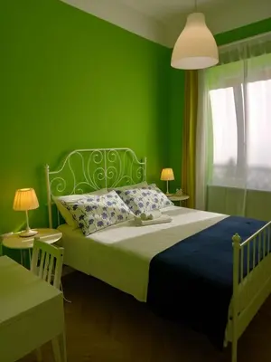 Letto o letti in una camera di B&B Stella Scugnizza