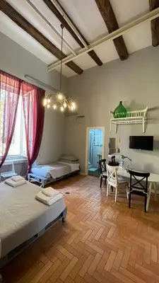 Letto o letti in una camera di Anima Partenopea