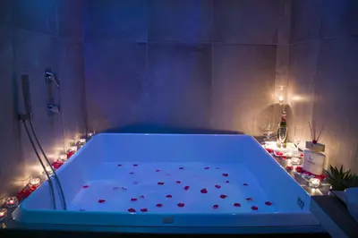 Letto o letti in una camera di Megaris Luxury Suite Rooms