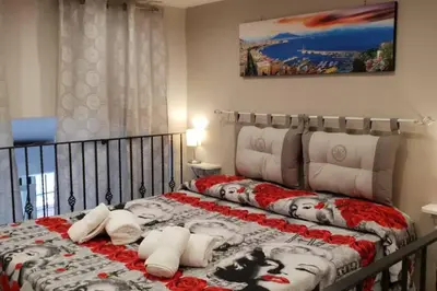 Letto o letti in una camera di Sisella basso suite dayuse