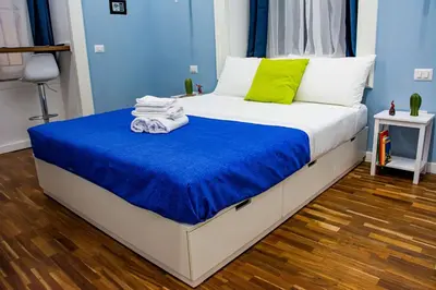 Letto o letti in una camera di Inner Naples