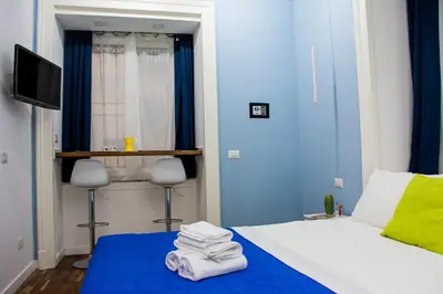 Letto o letti in una camera di Inner Naples
