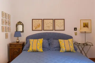 Letto o letti in una camera di CASA FIORITA