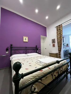 Letto o letti in una camera di In pieno centro storico - la casa di Anna