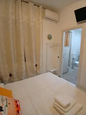 Letto o letti in una camera di Napoli Segreta