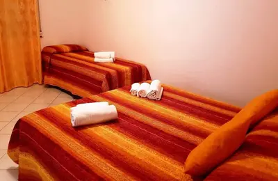Letto o letti in una camera di Napoli Segreta