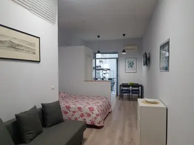 Letto o letti in una camera di Gardenia Napoli