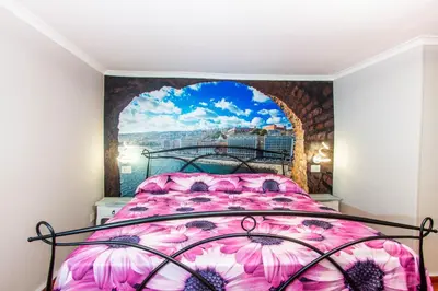 Letto o letti in una camera di Casa Napoli Stritt