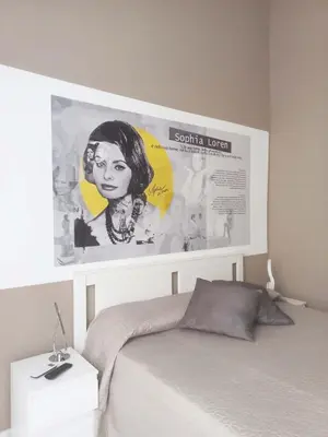 Letto o letti in una camera di Le stanze di Partenope