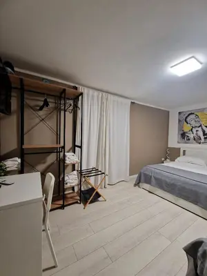 Letto o letti in una camera di Le stanze di Partenope