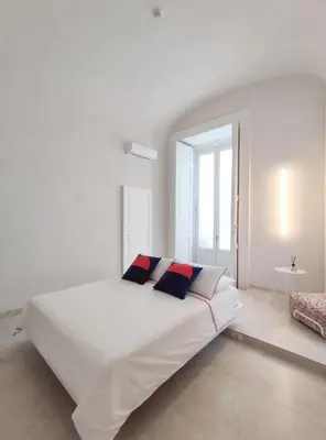 Letto o letti in una camera di Casa Celeste Aida
