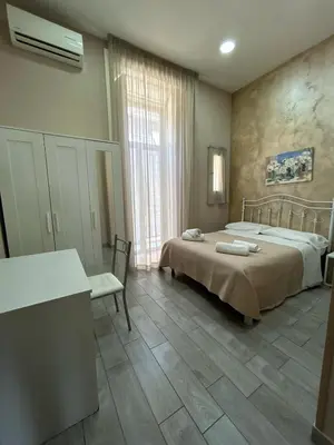 Letto o letti in una camera di B&B Panorama 17