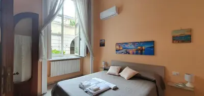 Letto o letti in una camera di Le Vie del Centro - B&B