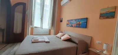 Letto o letti in una camera di Le Vie del Centro - B&B