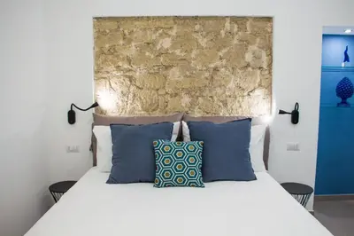 Letto o letti in una camera di Blue Plebiscito
