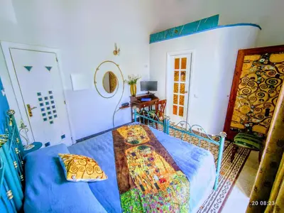 Letto o letti in una camera di Napoli naif