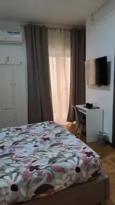 Letto o letti in una camera di Royal Poerio