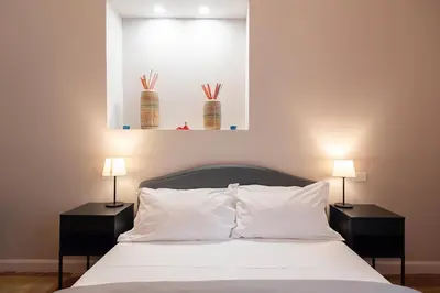 Letto o letti in una camera di B&B o' Panar al Duomo