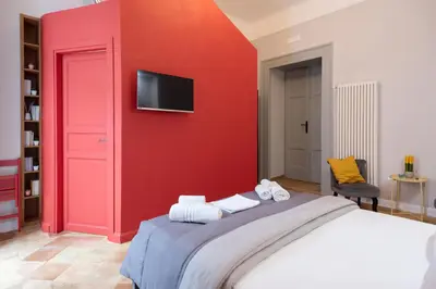 Letto o letti in una camera di B&B o' Panar al Duomo