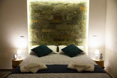 Letto o letti in una camera di Plebiscito House - Casa Vacanze Napoli