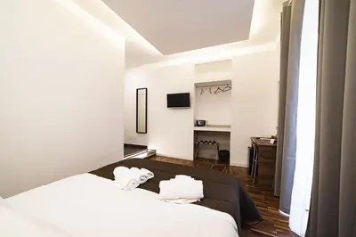 Letto o letti in una camera di B&b Onda Napoli